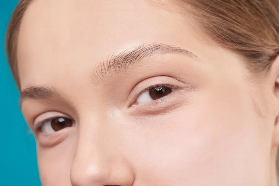 A close-up photo showcasing a woman’s natural skin and eye detail, emphasizing natural beauty.