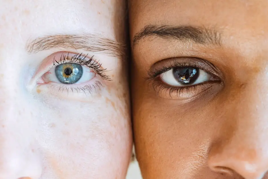 A close-up of two diverse individuals’ eyes, showcasing beauty and individuality.